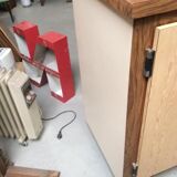 Old fridge behind wooden bar