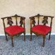 Pair of neo-Renaissance Henri II corner armchairs in carved wood, 19th century.