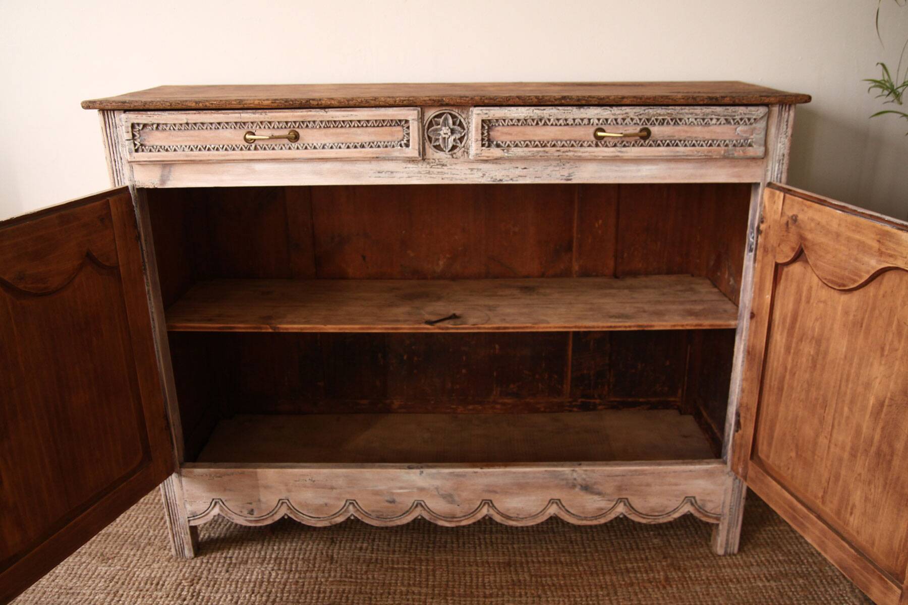 Patinated and sculpted buffet