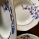 Saint Amand hollow plates decorated with red and blue flowers