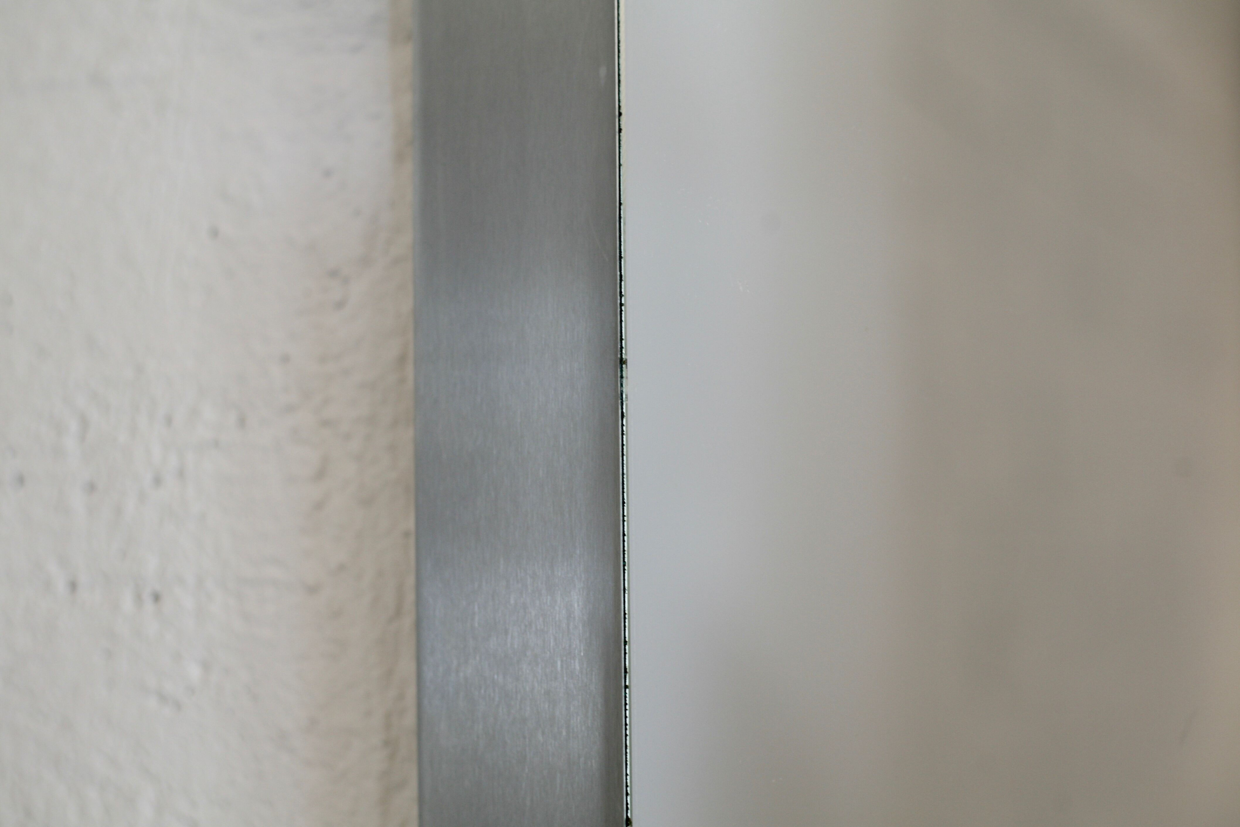 Mirror "space age". Stainless steel. France, circa 1970