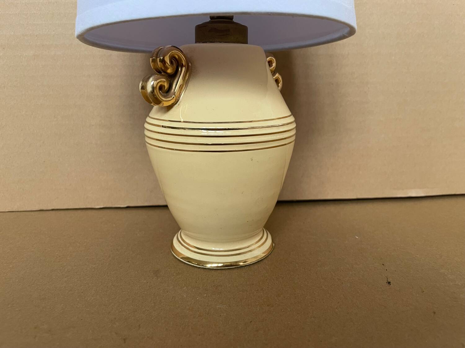 Small antique ear lamp