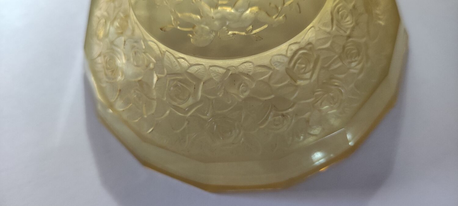 Old empty cup golden yellow glass pocket