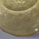 Old empty cup golden yellow glass pocket