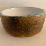 Round ashtray signed in sandstone with glazed interior
