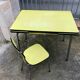 Bright yellow formica vintage table and chair