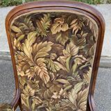 Louis XV Voltaire armchair in solid wood and floral velvet fabric from the years.