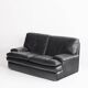 Black leather two-seater sofa. Roche Bobois edition. France, 1980s.