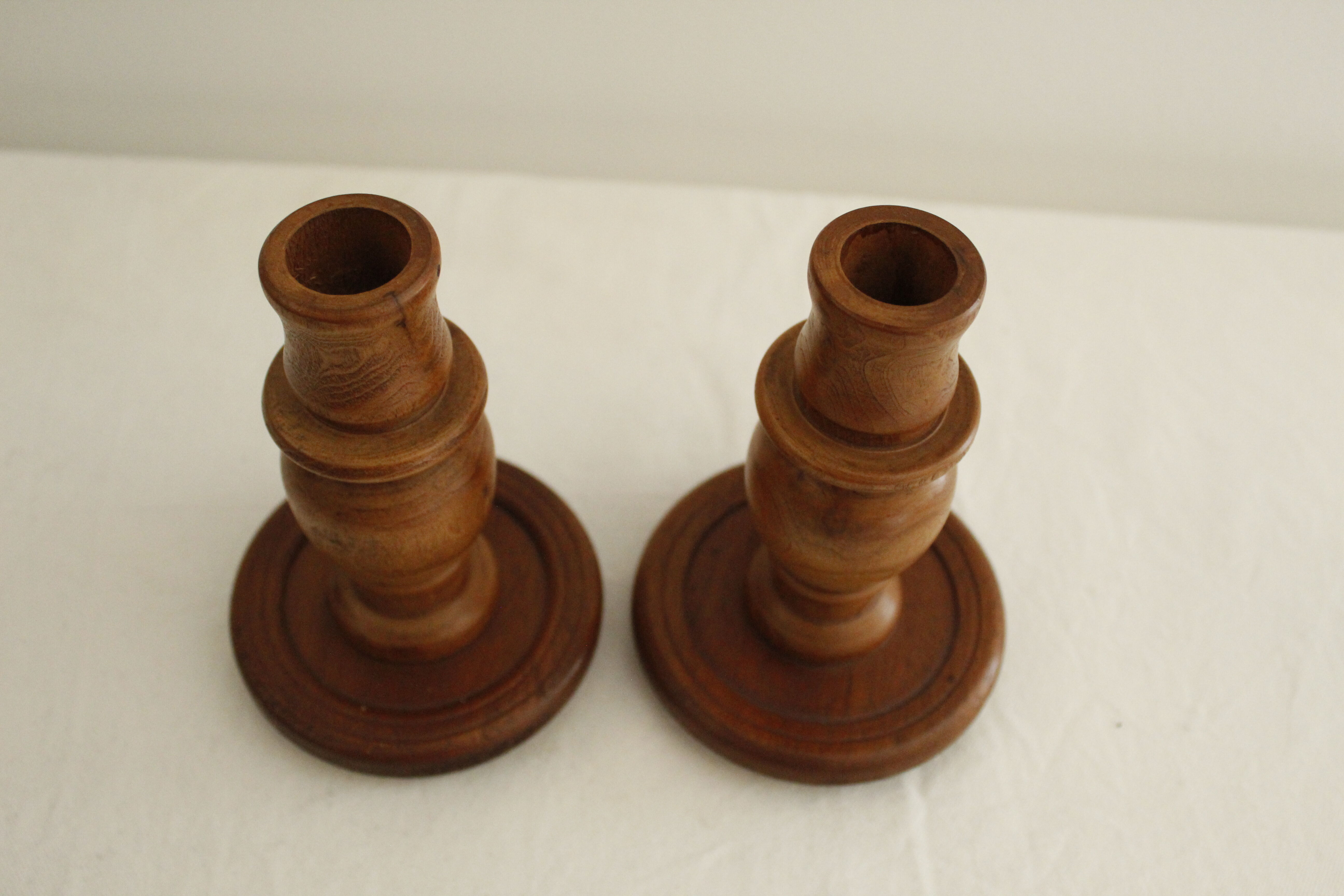 2 wooden candle holders
