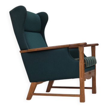 Fauteuil danois à haut dossier, années 1970, laine d'ameublement, bois de chêne massif.