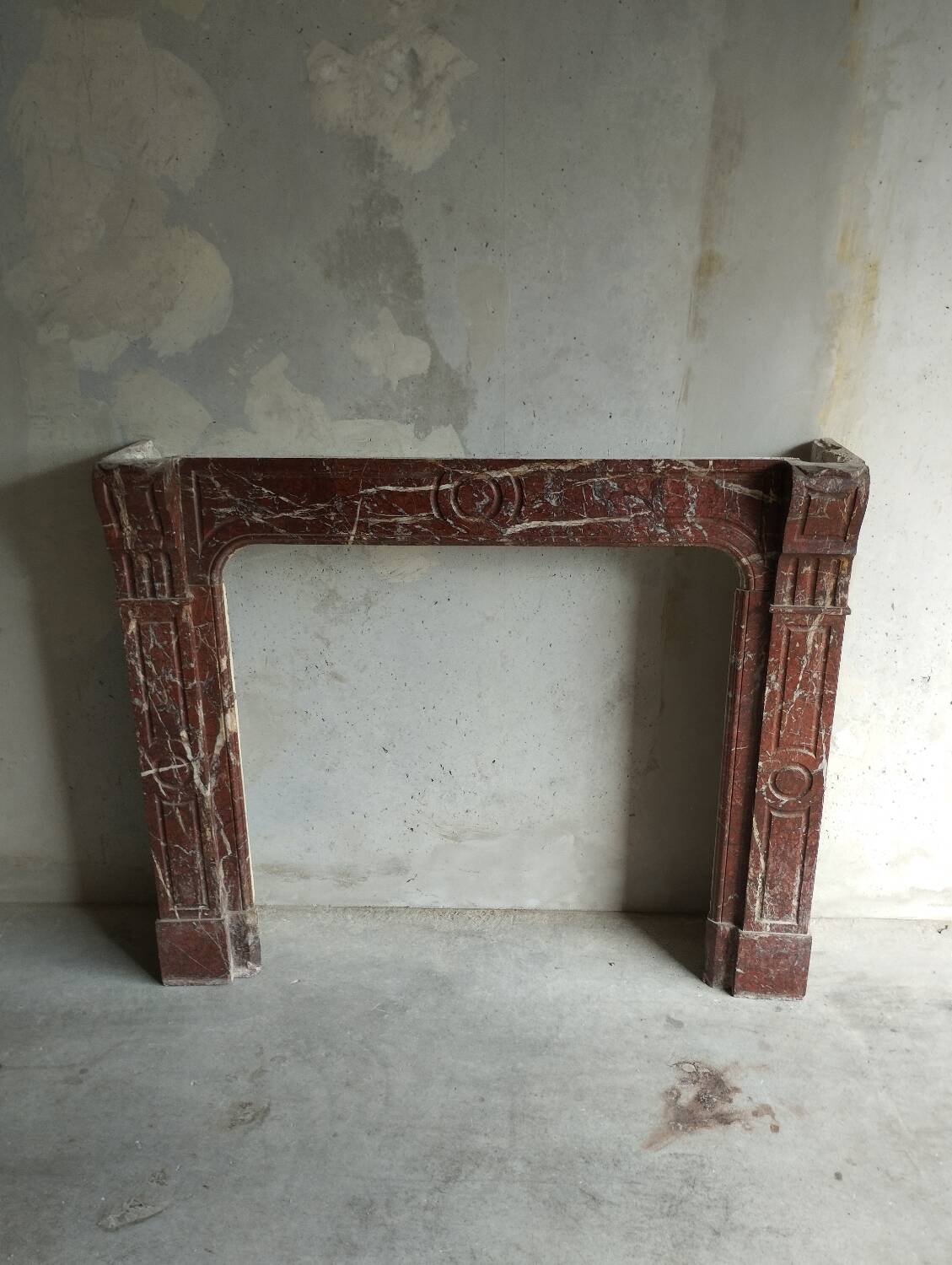 Old Louis XV red marble fireplace