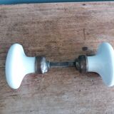White porcelain door knob handles