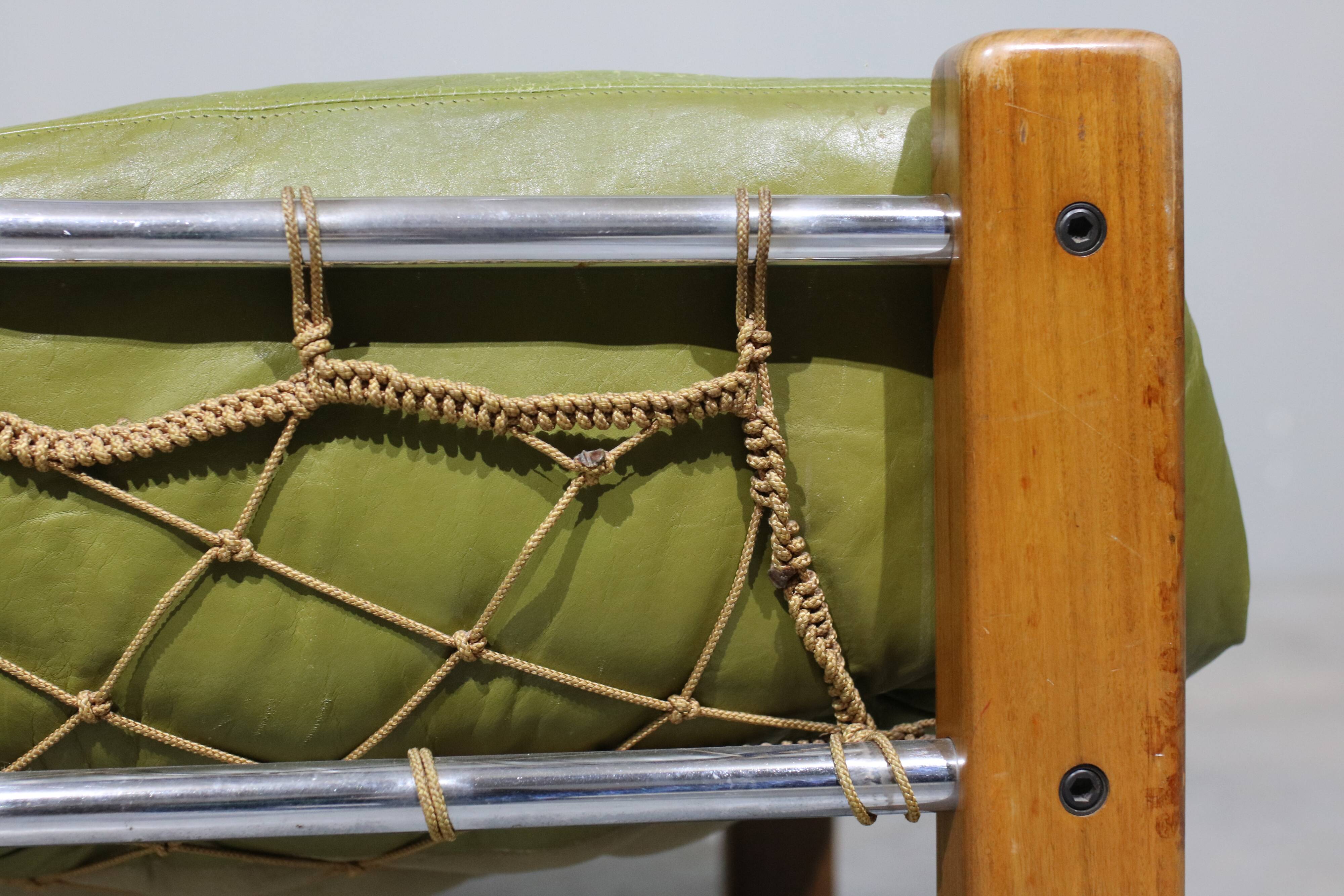 Leather Armchair and Ottoman by Jean Gillon