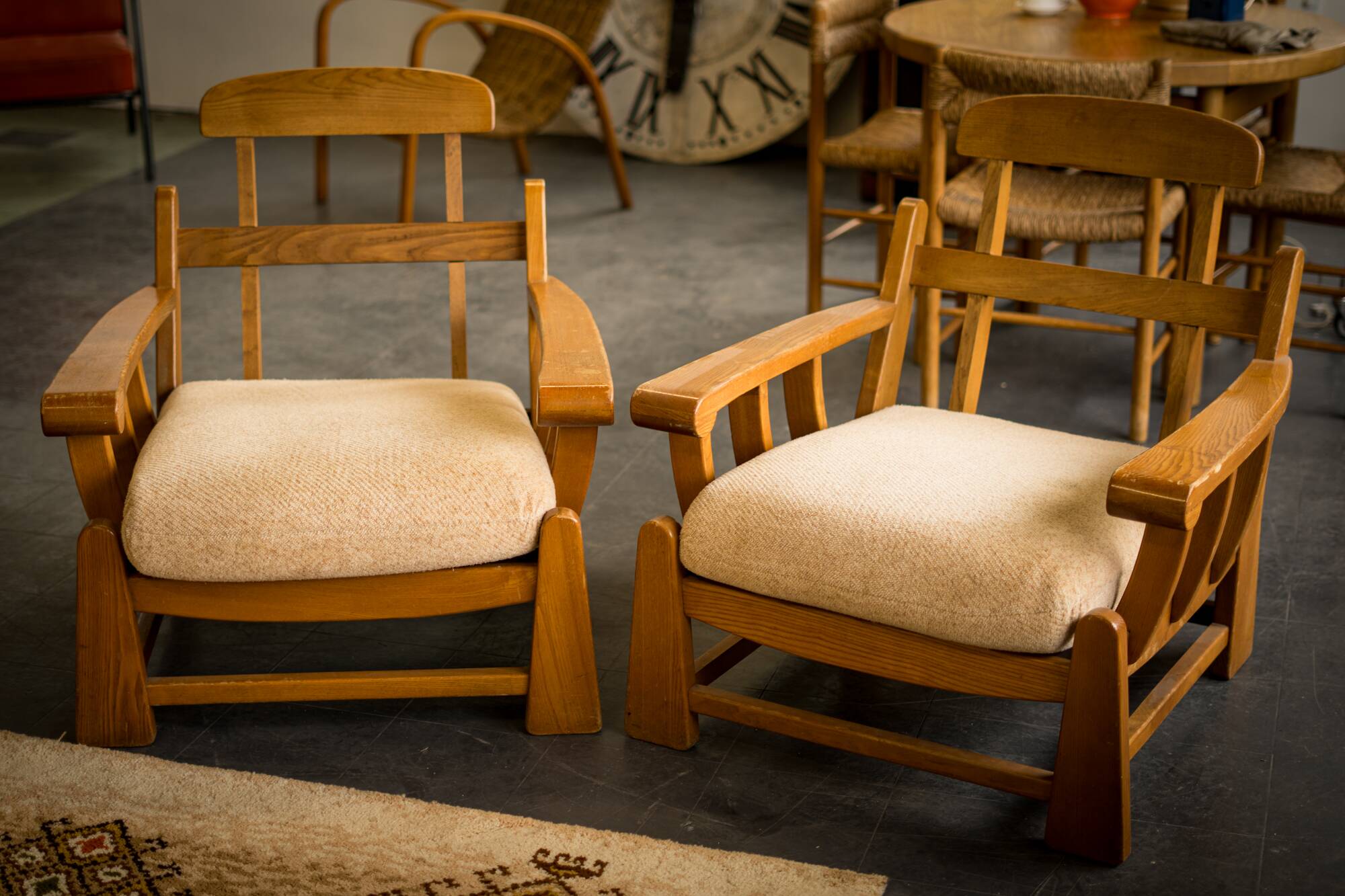 Armchairs in elm published by Maison Regain 1980