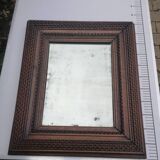 Old mirror with wooden frame