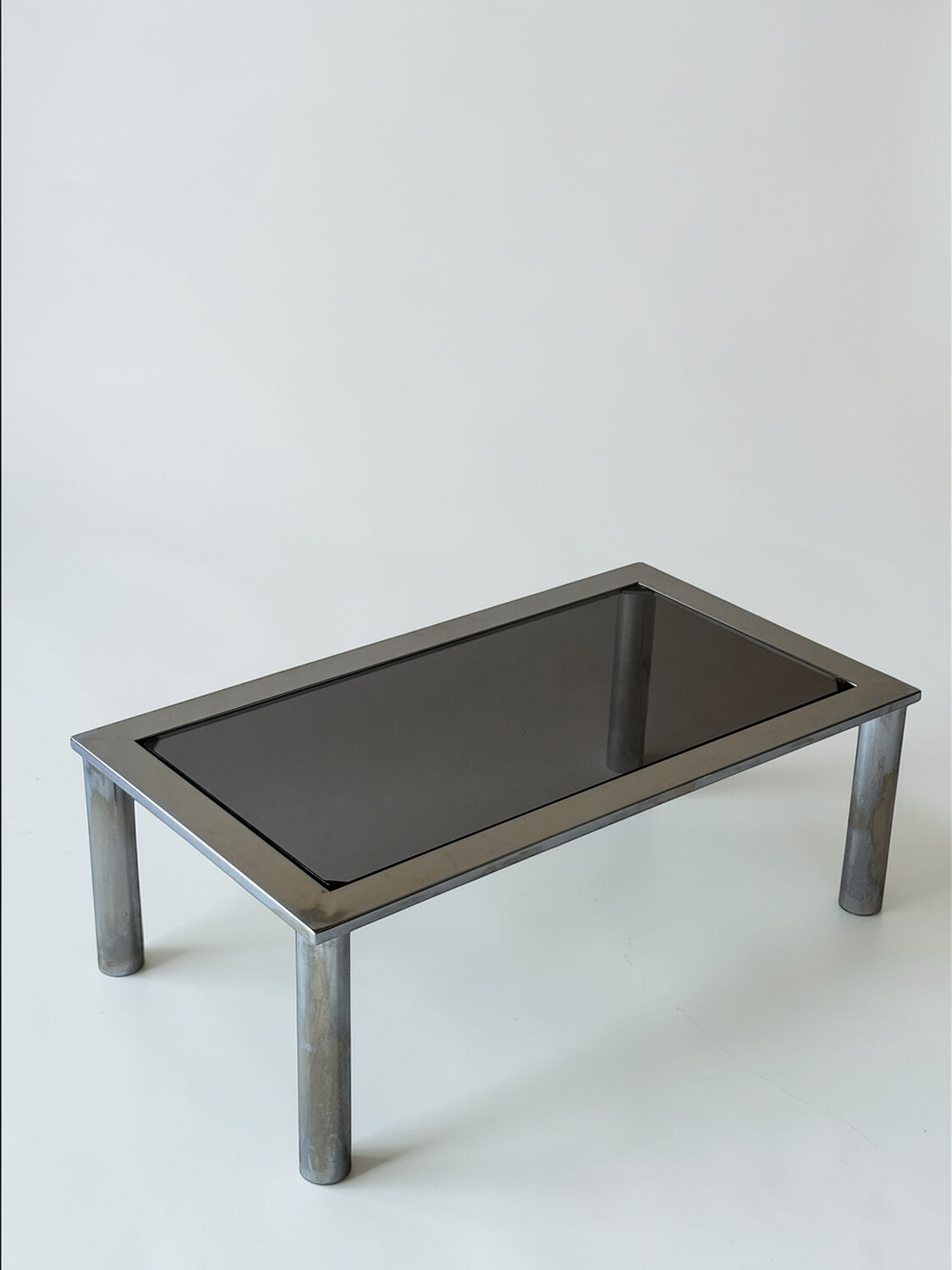 Chrome metal and smoked glass coffee table, 1970.
