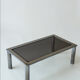 Chrome metal and smoked glass coffee table, 1970.