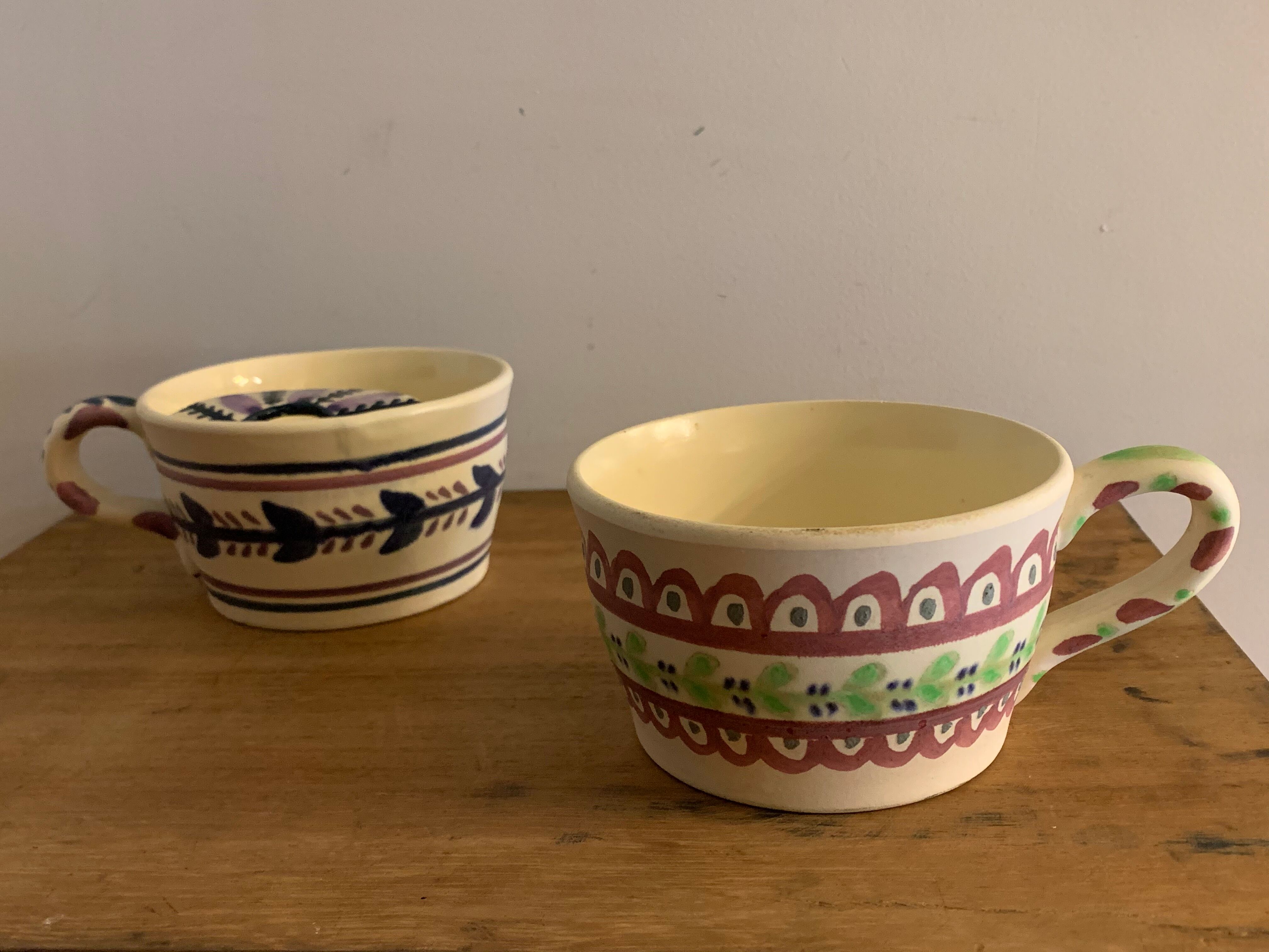 Pair of ceramic cups including a mustache cup for gentleman