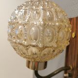 Wall light in rosewood with bobble glass ball shade.