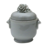 White porcelain jar on wrist