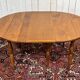 Round cherry wood table, 6 feet, Louis Philippe style with 2 extensions.