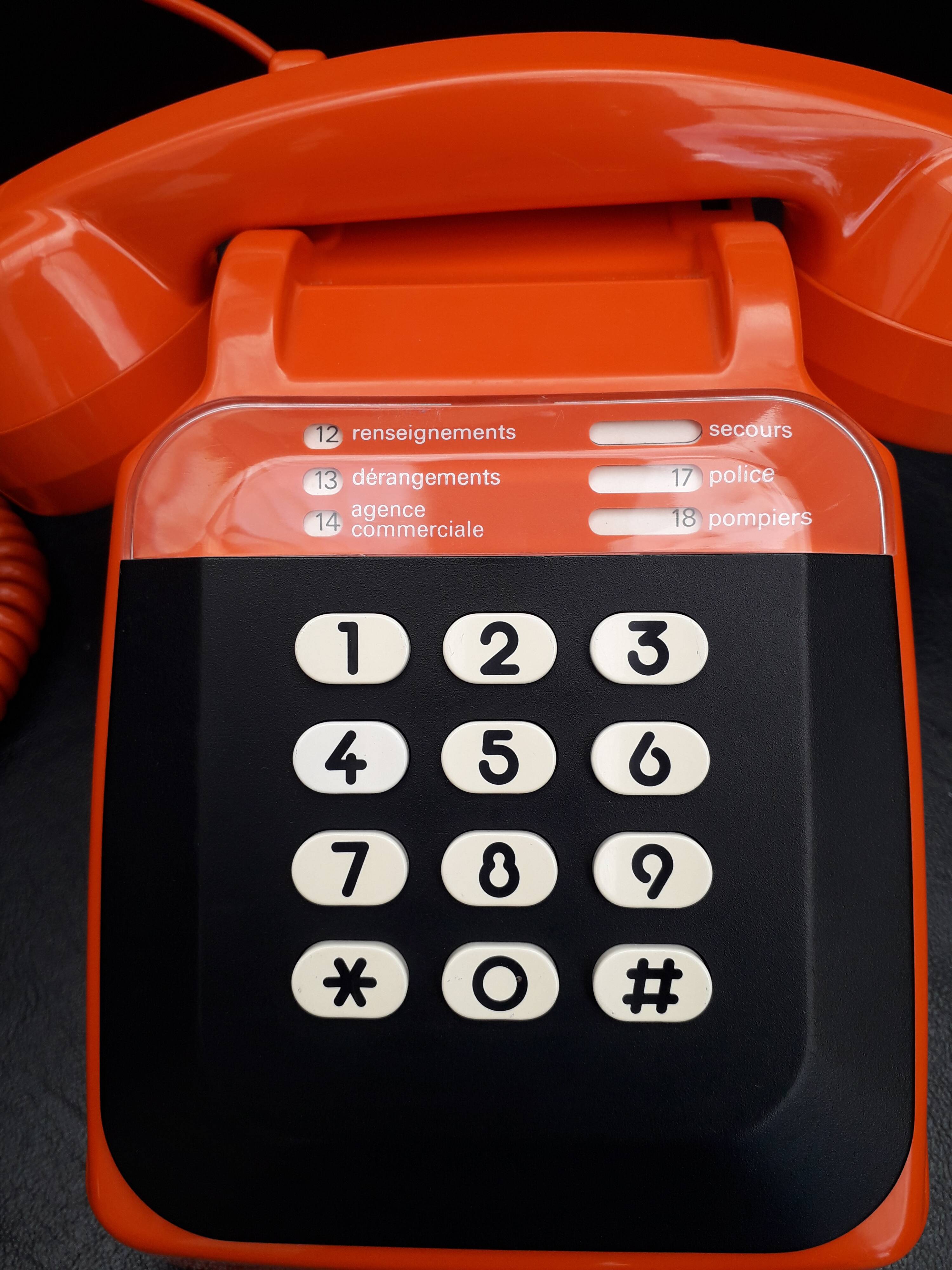 Old vintage orange phone s63 socotel