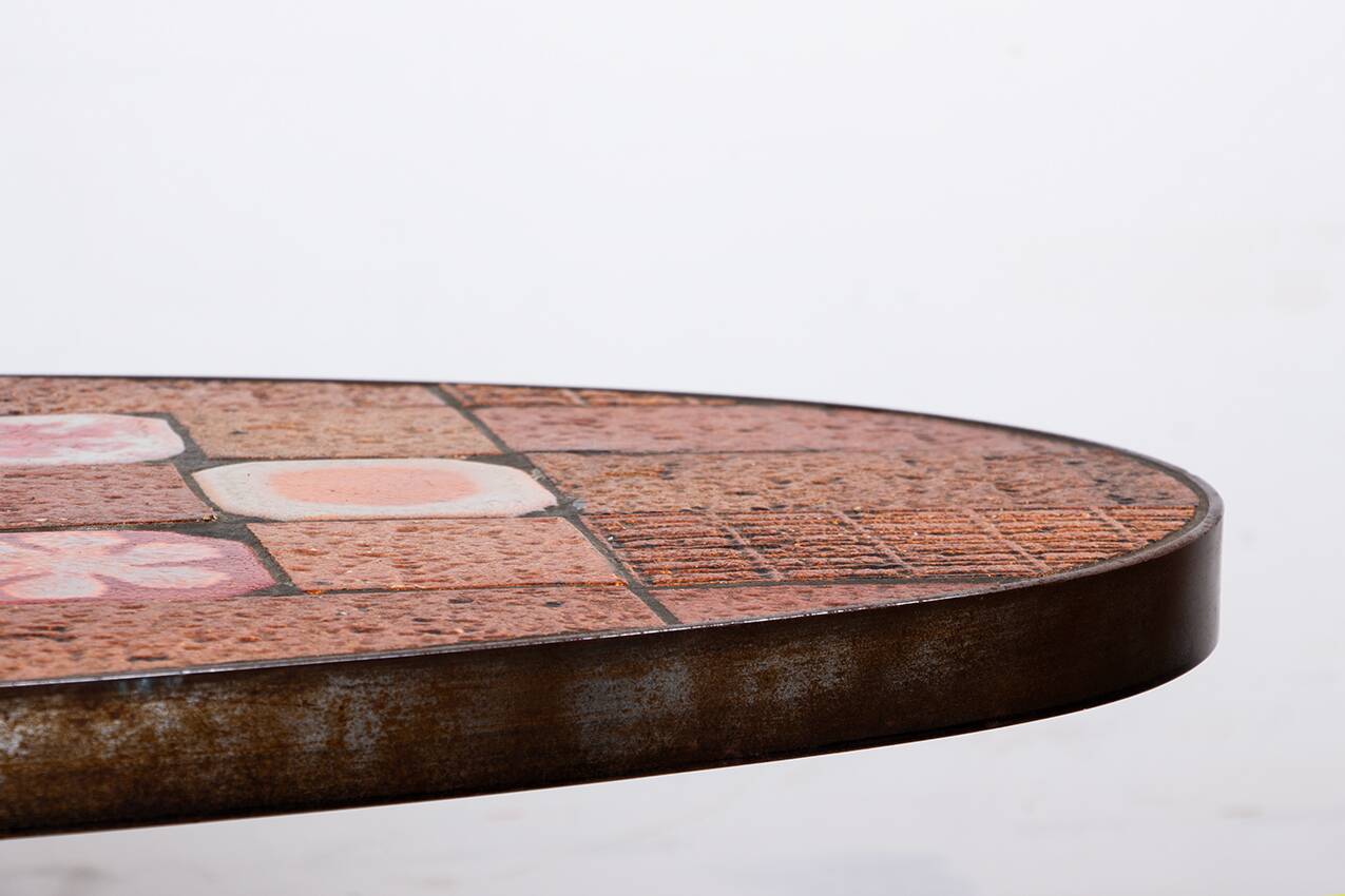 Lava stone, ceramic and steel coffee table by Jean Jaffeux 1960.