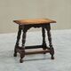 Rustic stool or side table in turned and carved solid oak, 19th century.
