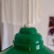 Industrial hanging in green metal with pulley