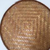 Wall composition of seven baskets and wicker trays