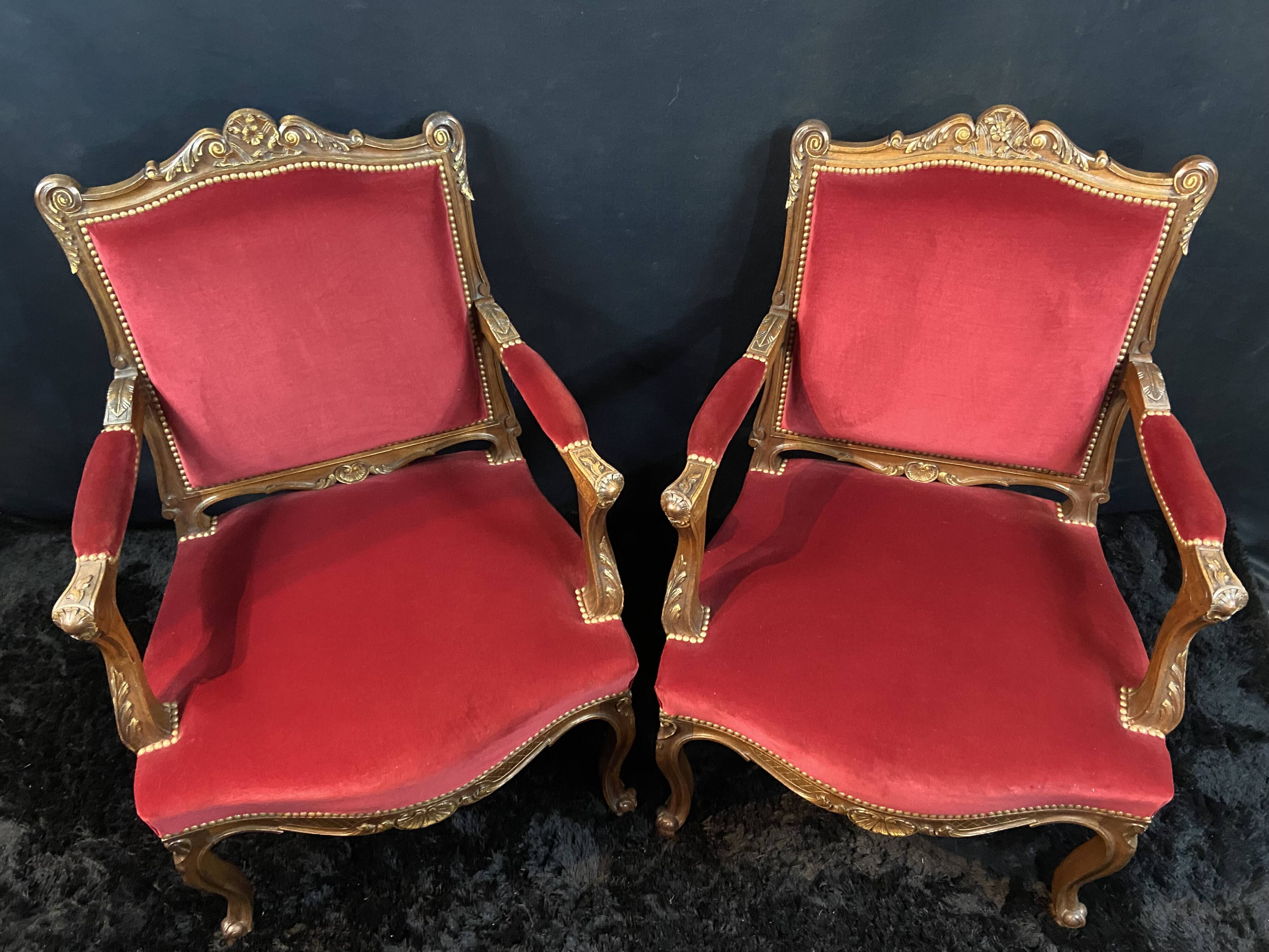 Pair of flat-back armchairs in Louis XV style in red velvet.