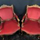 Pair of flat-back armchairs in Louis XV style in red velvet.