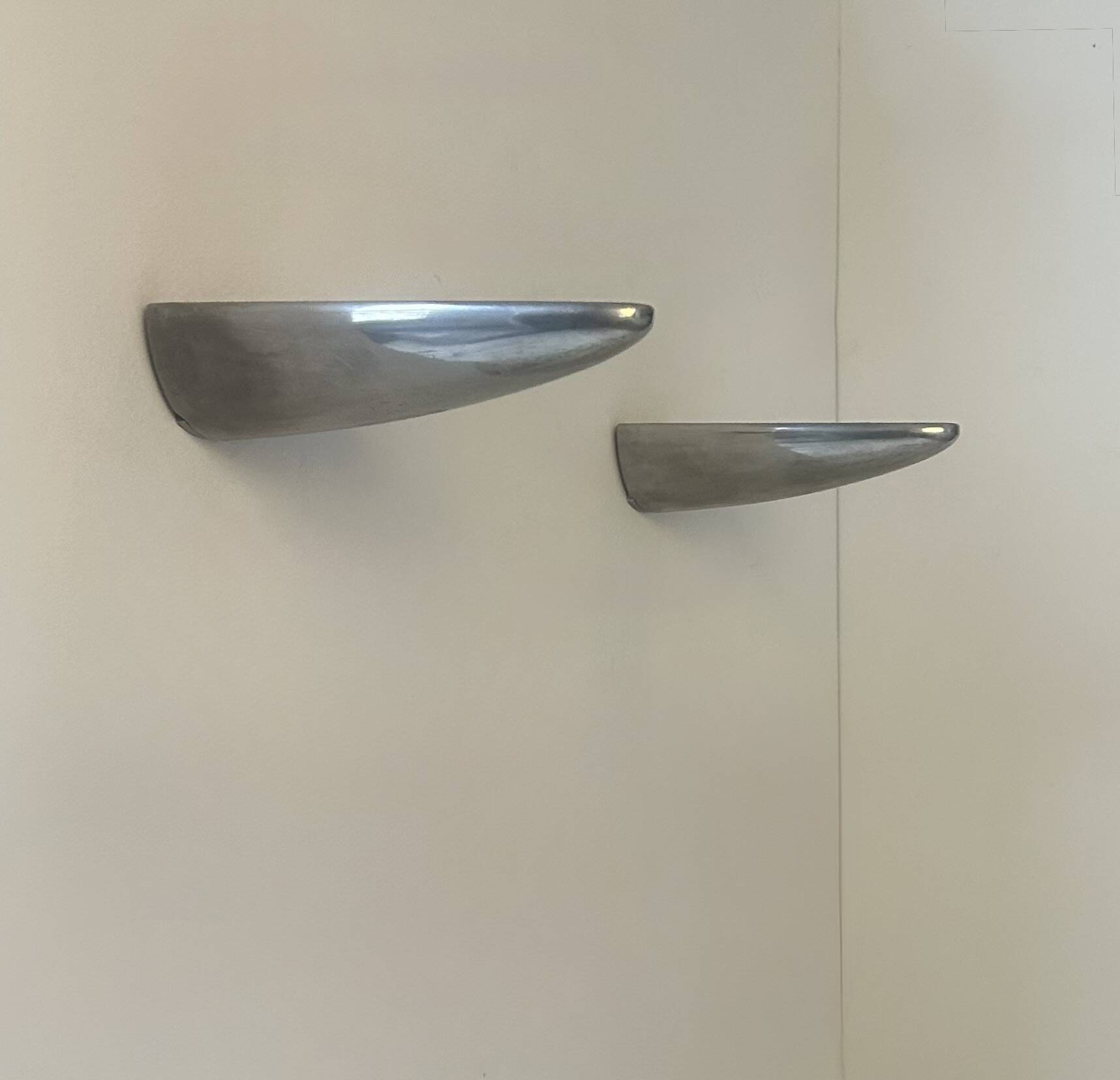 Pair of vintage wall lights, cast aluminum, France, 1980