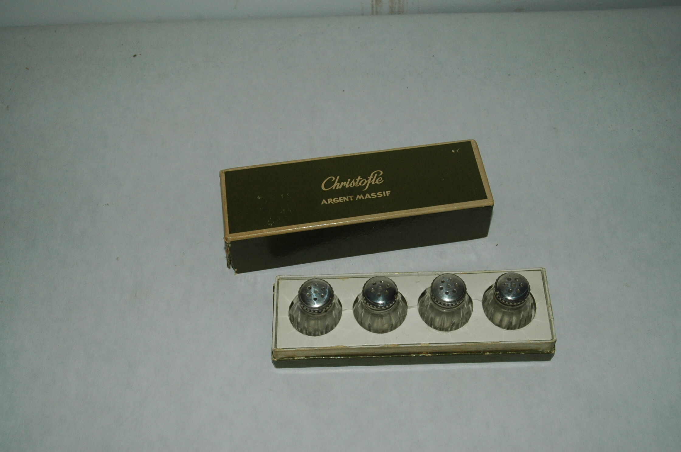 Set of 4 silver salt shakers and Christofle glass