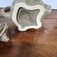 vintage ceramic teapot in the shape of a grey elephant