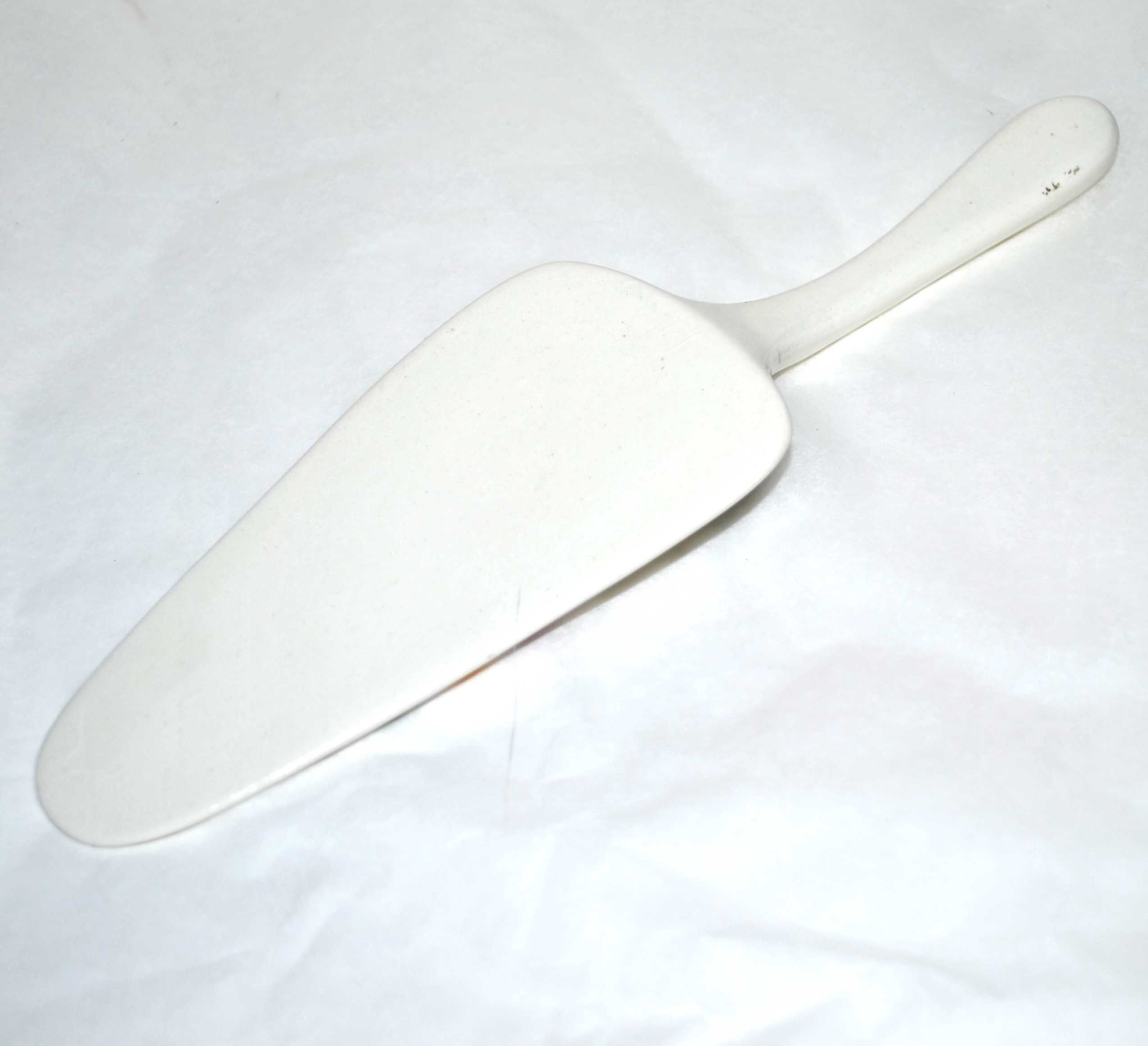 Colorful vintage ceramic pie shovel