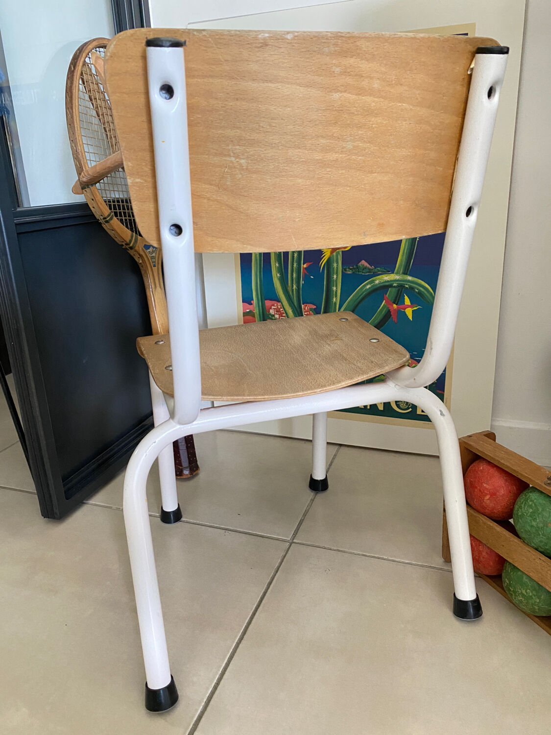 Old wooden and metal children's school chair