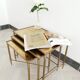Table gigogne en  laiton