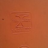 Duo of vintage chairs in orange skai