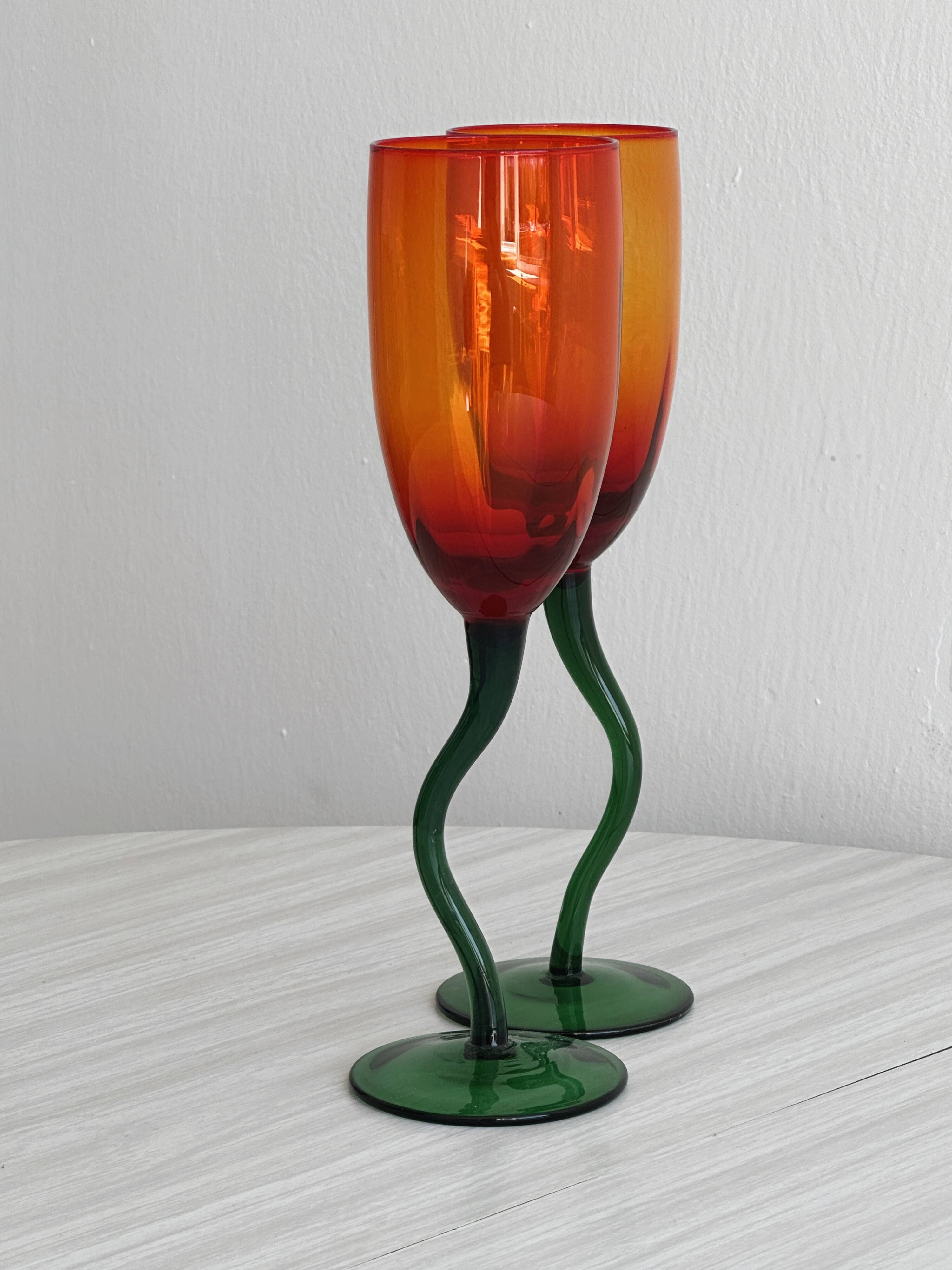 Pair of hand-blown orange glasses