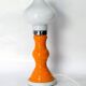 Table lamp or bedside lamp from the 1960s-70s in orange and chrome.
