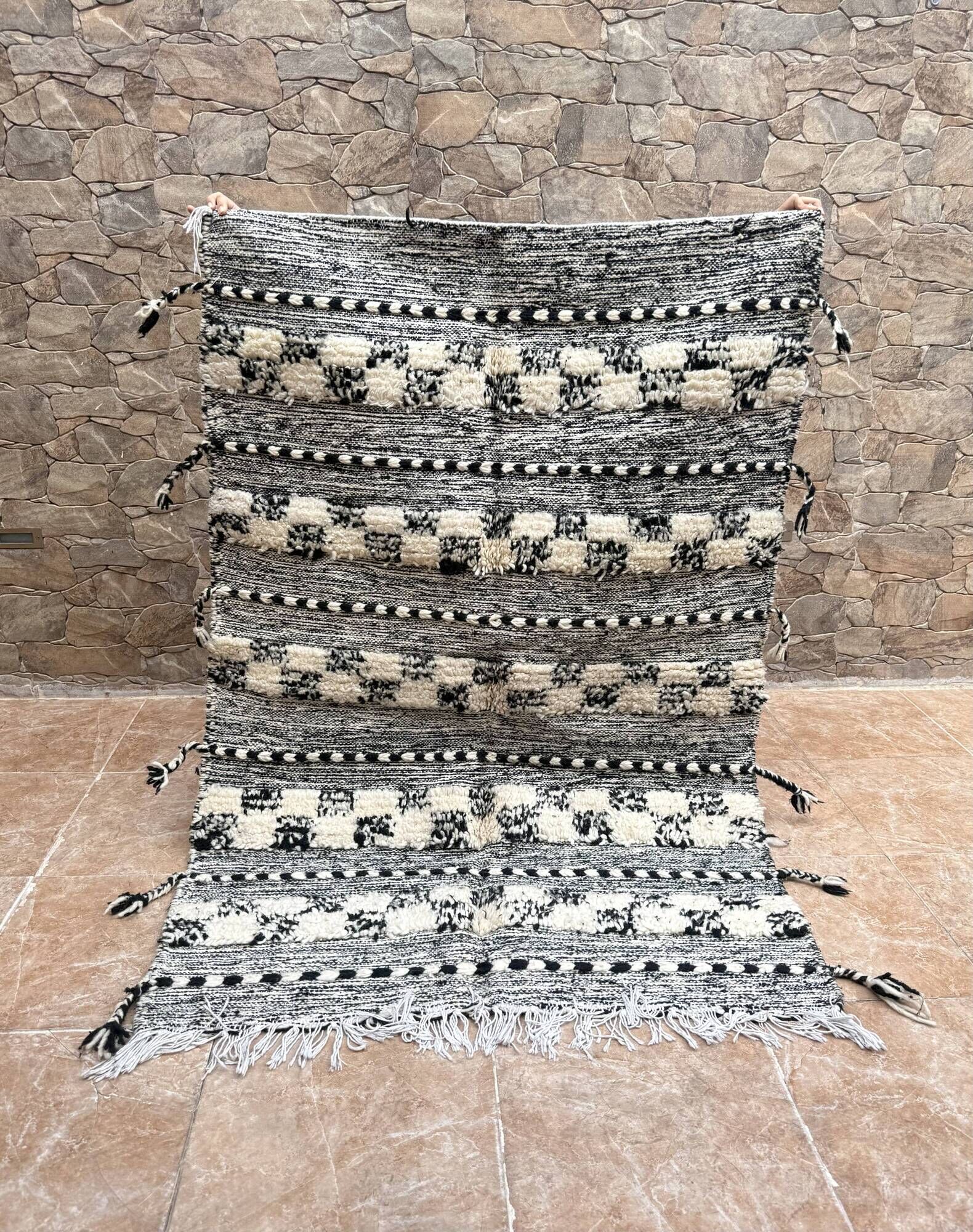 Small black Moroccan Berber Zanafi kilim rug for bedroom and living room.