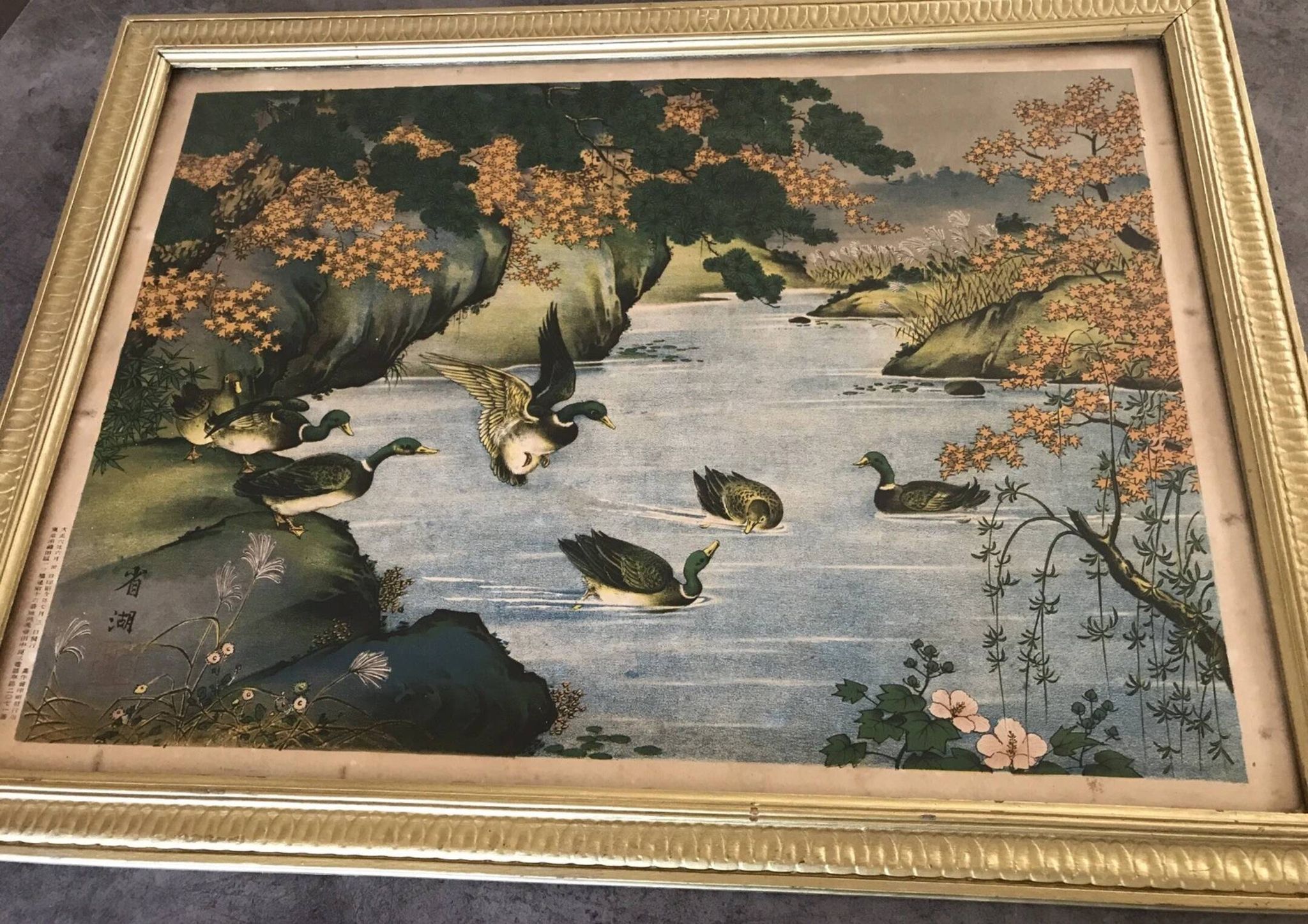 Old painting with a polychrome print decoration of ducks in nature.