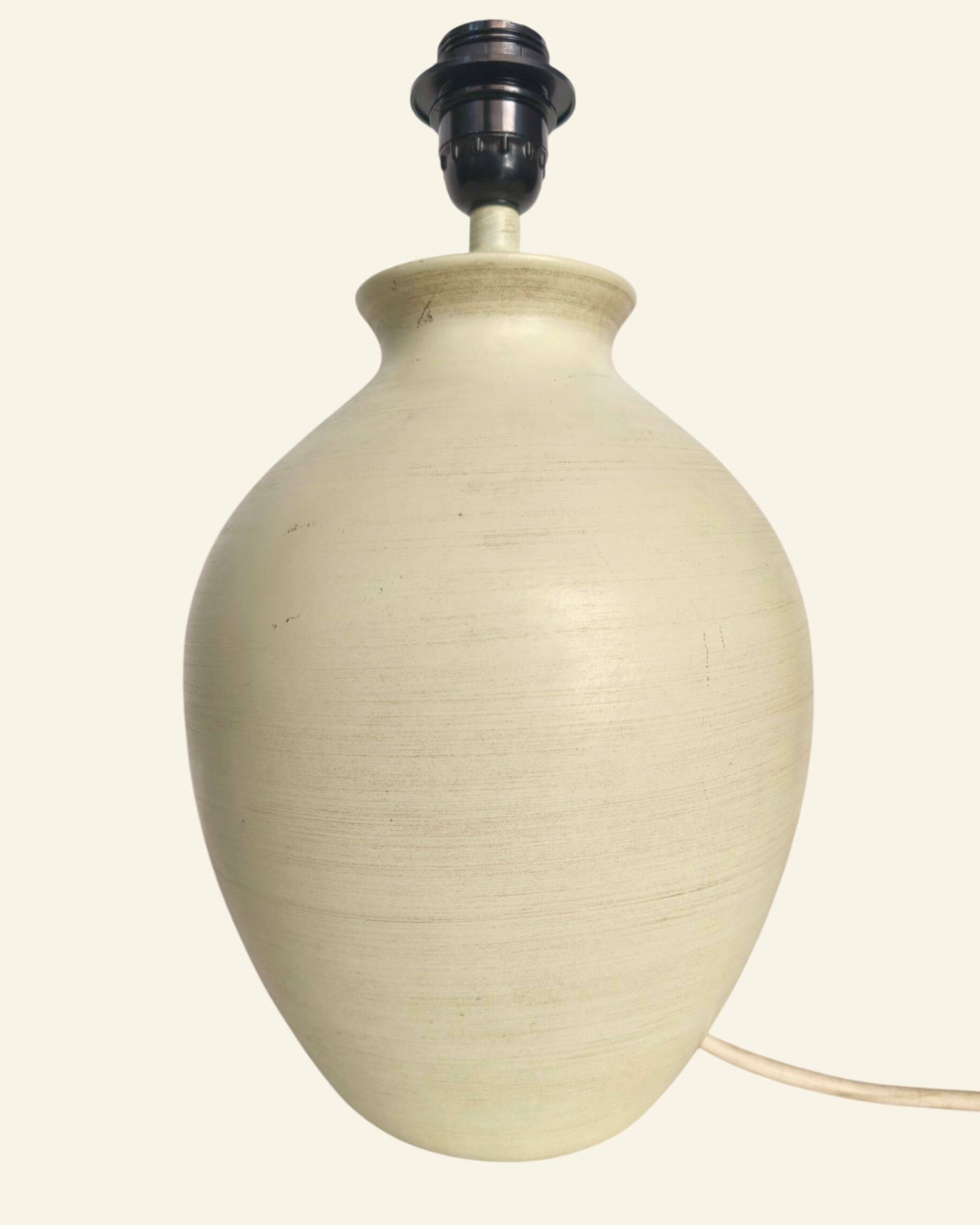 Ceramic lamp base turned in sand colour, organic shape.