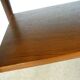 Curved Danish teak coffee table with additional shelf compartment, 1960s