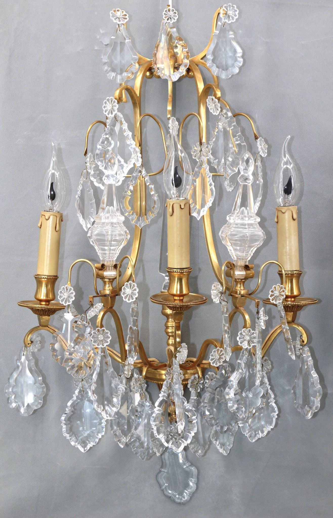 Pair of Louis XVI style gilded bronze & bohemian crystal sconces