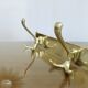 Large wall-mounted coat rack in gold aluminum, 60s-70s