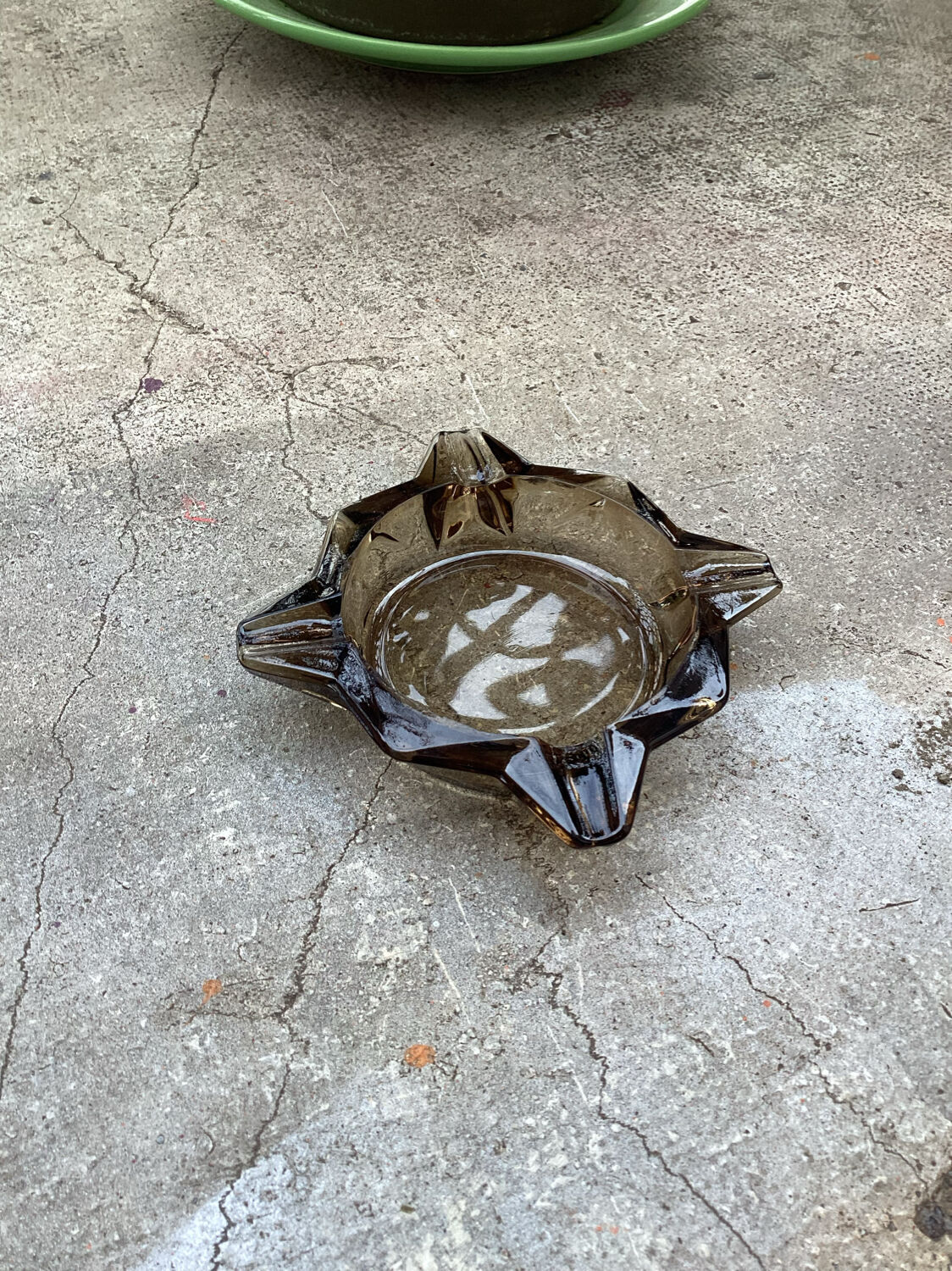 Empty ashtray vintage smoked glass pocket
