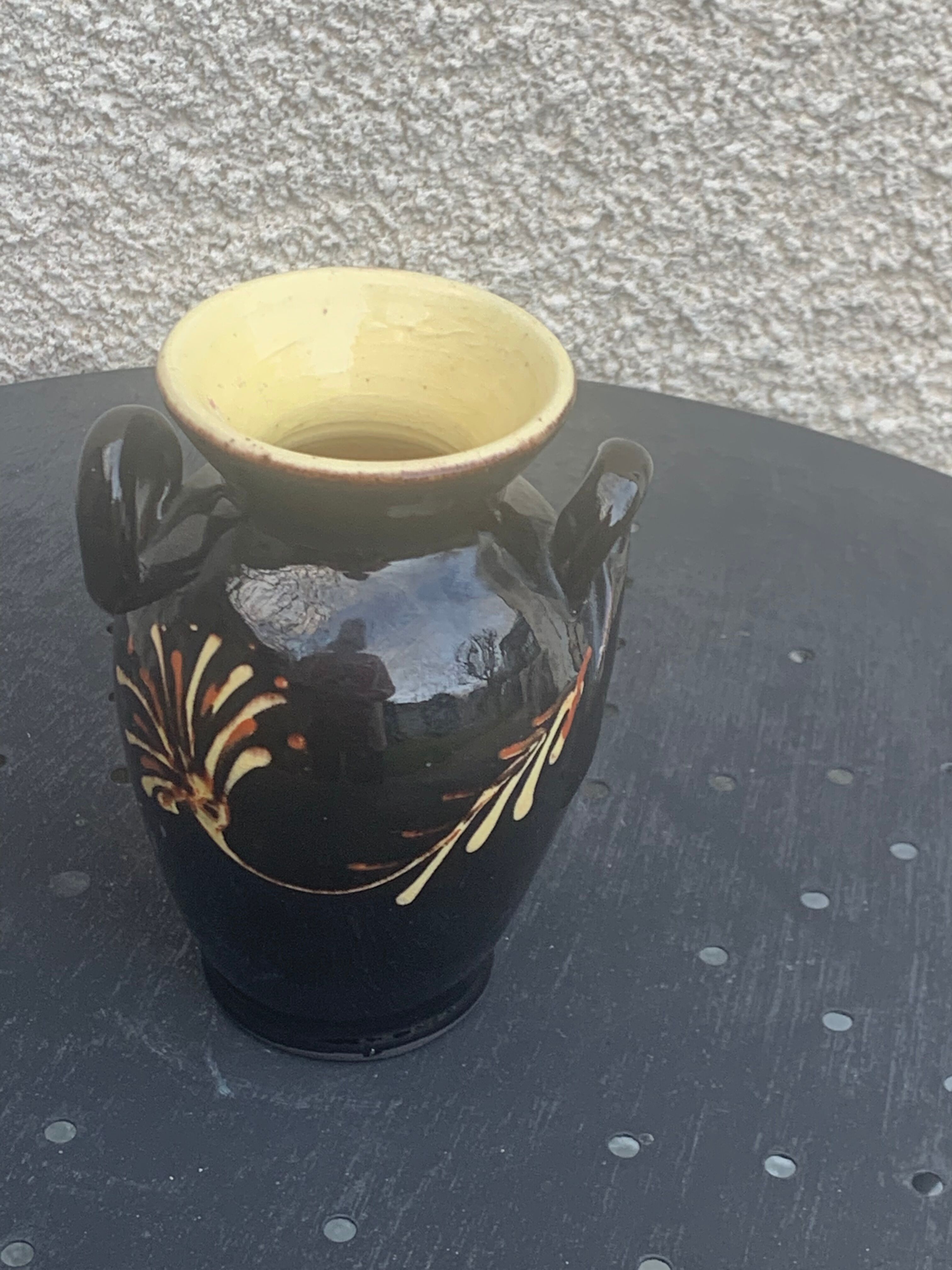 Vintage hand-painted yellow and black glazed ceramic amphora vase