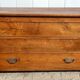 Old solid oak cabinet with its large drawer.